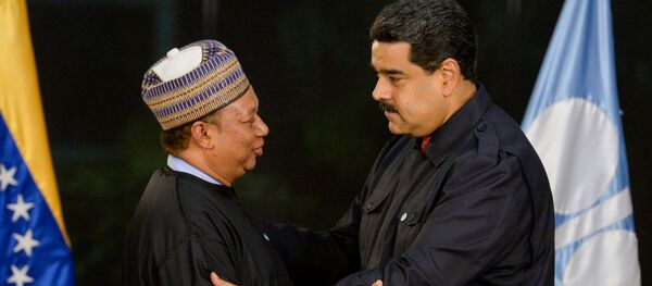 El secretario general del OPEP, Mohammed Barkindo, y el presidente de Venezuela, Nicolás Maduro - Sputnik Mundo