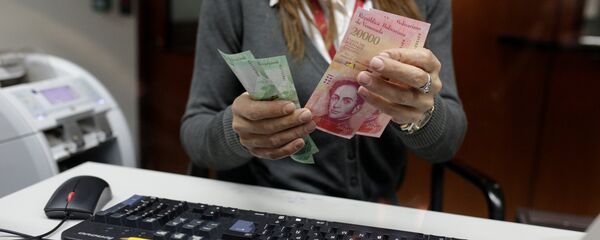Bolívares venezolanos (archivo) - Sputnik Mundo