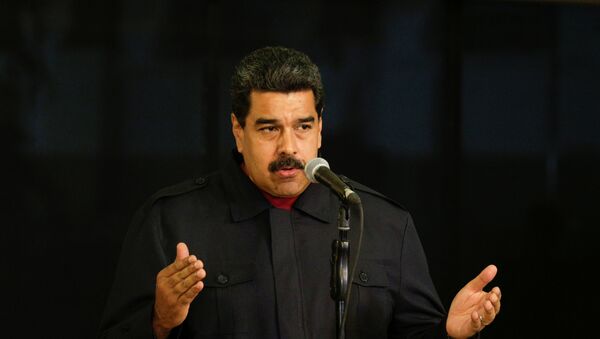 Venezuela's President Nicolas Maduro talks to the media during a news conference at Miraflores Palace in Caracas, Venezuela - Sputnik Mundo