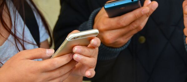 Un iphone - Sputnik Mundo