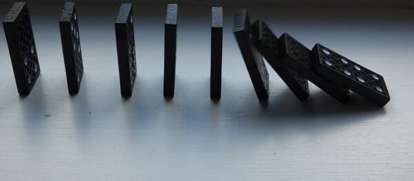 Dominó - Sputnik Mundo