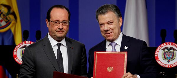 Francois Hollande, presidente de Francia, y Juan Manuel Santos, presidente  de Colombia - Sputnik Mundo