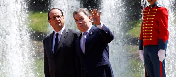 Francois Hollande, presidente de Francia, y Juan Manuel Santos, presidente de Colombia - Sputnik Mundo