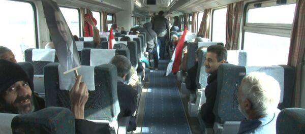 Un tren recorre las calles de Alepo por primera vez en cuatro años Un tren recorre las calles de Alepo por primera vez en cuatro años - Sputnik Mundo