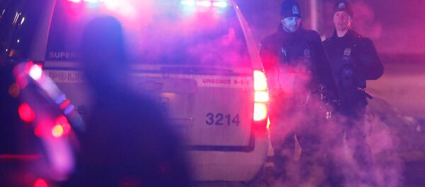 Policía en el lugar del tiroteo en Quebec Policía en el lugar del tiroteo en Quebec - Sputnik Mundo