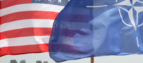 Las banderas de EEUU y OTAN - Sputnik Mundo