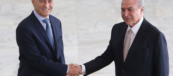El presidente argentino Mauricio Macri llega a Brasil en visita oficial para encontrarse con su homólogo brasileño Michel Temer y otras autoridades - Sputnik Mundo