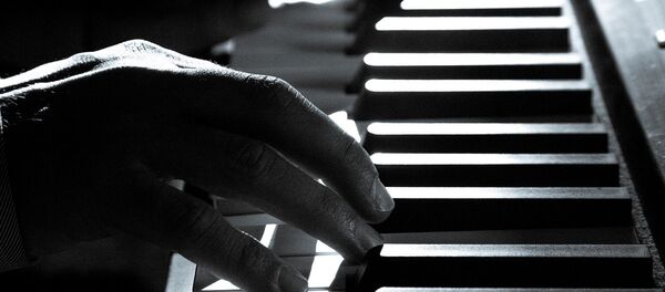 Un piano (imagen referencial) - Sputnik Mundo