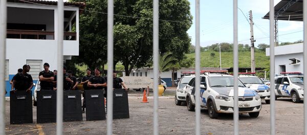 Police officers stand inside their headquarters in Cachoeira do Itapemirim, Espirito Santo, Brazil - Sputnik Mundo