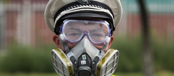 Policía chino en el municipio Tianjin, China, 15 de agosto de 2015. - Sputnik Mundo