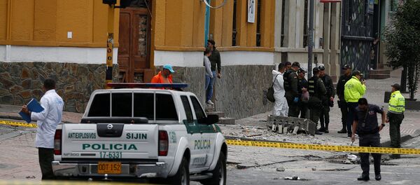Policía en el lugar de la explosión en Bogotá - Sputnik Mundo