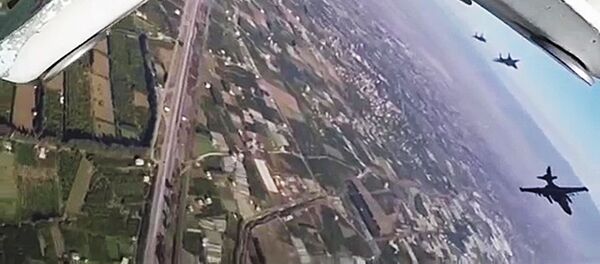 Aviones de combate Su-25 salen de la base aérea Hmeymim en Siria (imagen referencial) - Sputnik Mundo