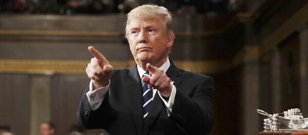 U.S. President Donald Trump reacts after delivering his first address to a joint session of Congress from the floor of the House of Representatives iin Washington, U.S., February 28, 2017 - Sputnik Mundo
