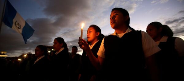 Homenaje a las víctimas del incendio en Guatemala - Sputnik Mundo