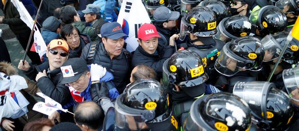Los protestas en Seúl - Sputnik Mundo