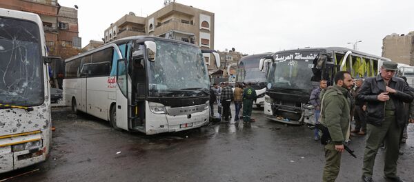 El lugar de doble explosión en Damasco El lugar de doble explosión en Damasco - Sputnik Mundo