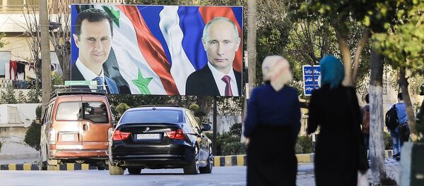 Los retratos de Bashar Asad y Vladímir Putin en Alepo, Siria - Sputnik Mundo