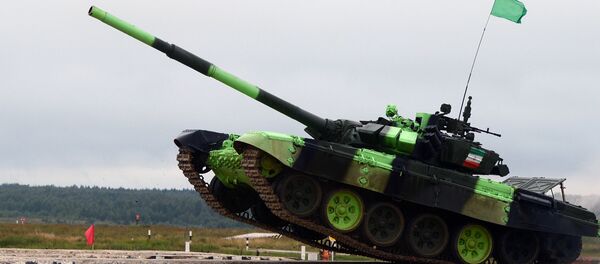Iran's T-72BZ tank crew during a tank biathlon competition at the Alabino training ground - Sputnik Mundo