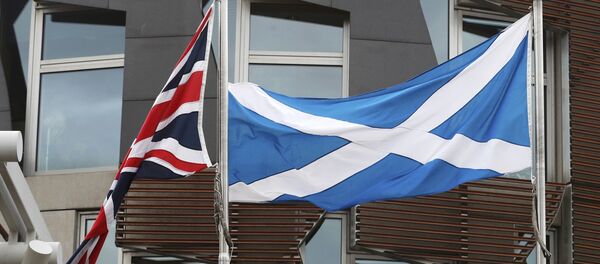 Banderas de Reino Unido e Escocia - Sputnik Mundo