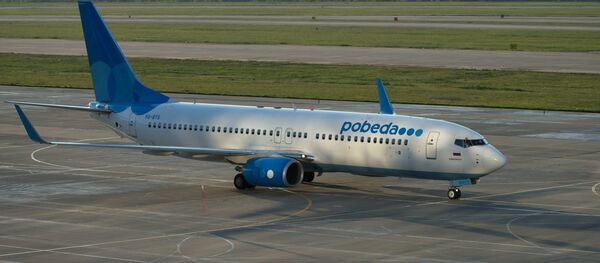 Boeing 737-8FZ de la aerolínea Pobeda (archivo) Boeing 737-8FZ de la aerolínea Pobeda (archivo) - Sputnik Mundo