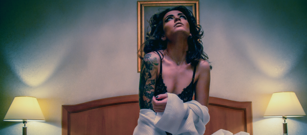 Una mujer semidesnuda (archivo) Una mujer semidesnuda (archivo) - Sputnik Mundo