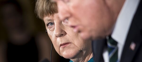 El presidente estadounidense, Donald Trump, y la canciller alemana, Ángela Merkel - Sputnik Mundo