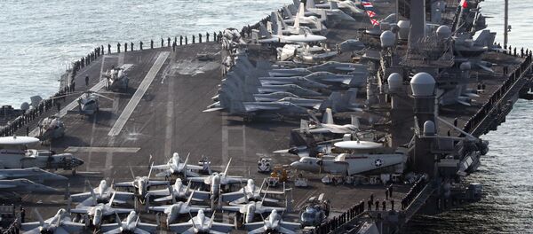 U.S. aircraft carrier USS Carl Vinson arrives for an annual joint military exercise called Foal Eagle between South Korea and U.S, at the port of Busan, South Korea, March 15, 2017. - Sputnik Mundo