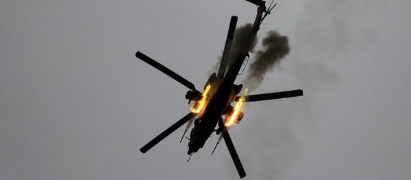 Helicóptero iraquí ataca las posiciomes de Daesh - Sputnik Mundo