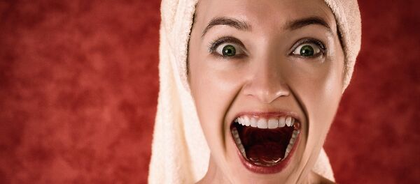 Una mujer (archivo) - Sputnik Mundo