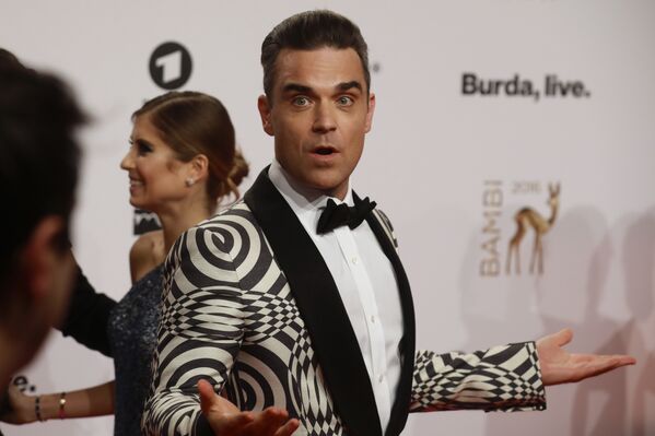 Parece que nacer en el año del tigre ya te garantiza tener muchos éxitos en la vida. Este es el ejemplo del cantante británico Robbie Williams, a quien el mismísimo Elton John le llamó el Frank Sinatra del siglo XXI. Quizás este sea el mejor nombre para el artista extranjero más vendido en los países latinoamericanos. - Sputnik Mundo