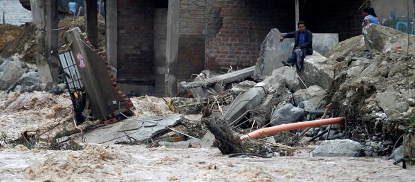 Consecuencias de inundaciones en Perú Consecuencias de inundaciones en Perú - Sputnik Mundo