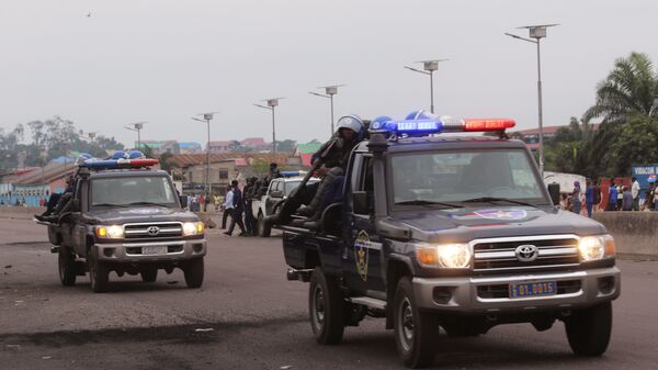 Congo riot police on patrol, after violence erupted due to the delay of the presidential elections in Kinshasa, Democratic Republic of Congo, Tuesday, Sept. 20, 2016 - Sputnik Mundo