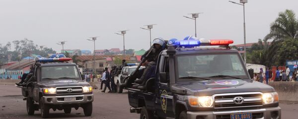 Congo riot police on patrol, after violence erupted due to the delay of the presidential elections in Kinshasa, Democratic Republic of Congo, Tuesday, Sept. 20, 2016 - Sputnik Mundo