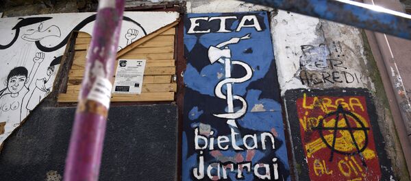 Picture shows a graffiti representing the logo of the armed Basque separatist group ETA in the northern Spanish Basque village of Bermeo - Sputnik Mundo