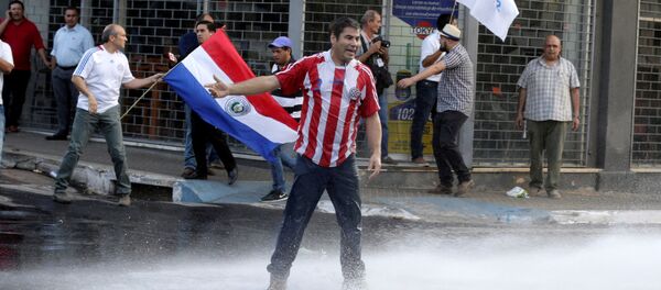 Protesta contra un proyecto de reforma constitucional en Paraguay - Sputnik Mundo