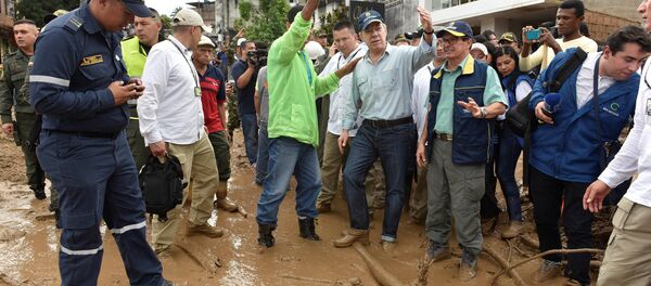 Juan Manuel Santos, presidente de Colombia, en el municipio de Mocoa, en Putumayo (suroeste) - Sputnik Mundo