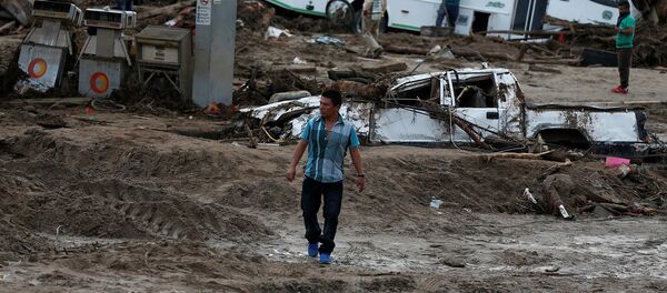 Una avalancha de lodo y piedras en el municipio de Mocoa, Putumayo, Colombia - Sputnik Mundo