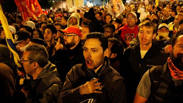 Supporters of Ecuadorean presidential candidate Guillermo Lasso demonstrate during a national election day in Quito, Ecuador Supporters of Ecuadorean presidential candidate Guillermo Lasso demonstrate during a national election day in Quito, Ecuador - Sputnik Mundo