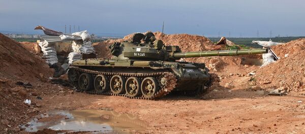 El tanque en una posición del Ejército sirio al norte de la ciudad de Hama - Sputnik Mundo