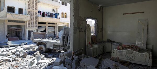 Consecuencias de los bombardeos en Idlib - Sputnik Mundo