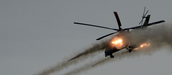 Helicóptero ruso Mi-35 en acción - Sputnik Mundo
