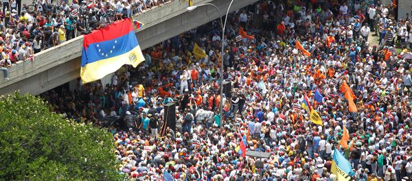 A general view shows an opposition rally in Caracas, Venezuela - Sputnik Mundo