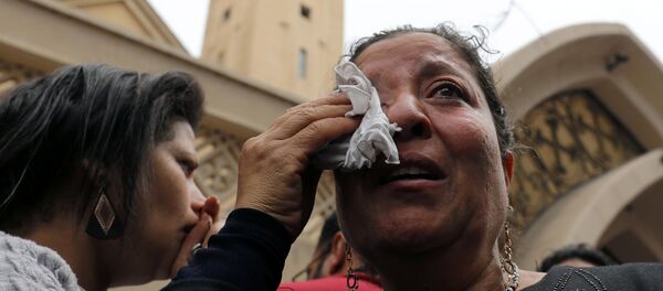 Unas mujeres tras la explosión en la ciudad egipcia de Tanta - Sputnik Mundo