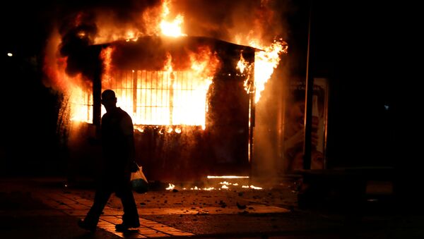 Los disturbios en Caracas - Sputnik Mundo