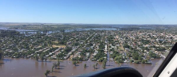 Más de 600 personas desplazadas por las inundaciones en Artigas, al norte de Uruguay (archivo) Más de 600 personas desplazadas por las inundaciones en Artigas, al norte de Uruguay (archivo) - Sputnik Mundo