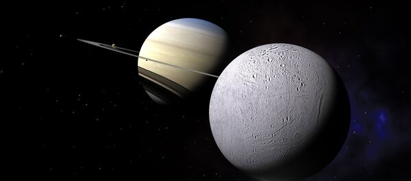 Encélado orbita alrededor de Saturno (ilustración gráfica) - Sputnik Mundo