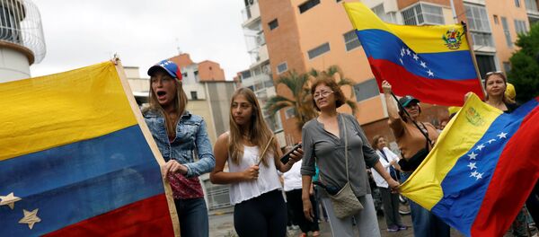 Manifestantes en Caracas, Venezuela (archivo) - Sputnik Mundo