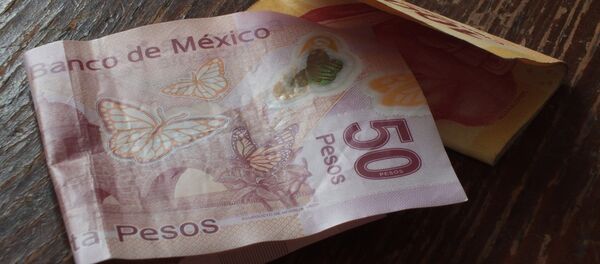 Pesos mexicanos Pesos mexicanos - Sputnik Mundo