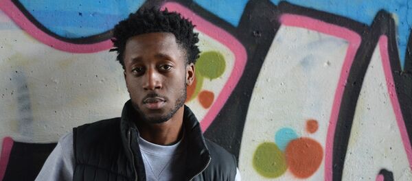 Un afrodescendiente - Sputnik Mundo