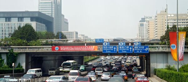 El tráfico en Pekín El tráfico en Pekín - Sputnik Mundo